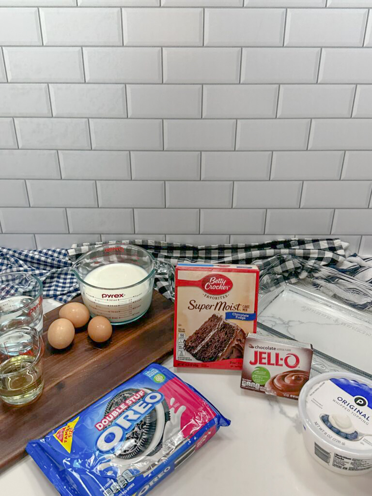 Ingredients siting on the counter for oreo dirt cake recipe