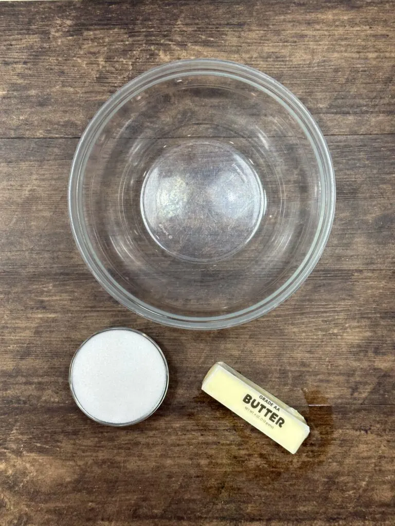 Large bowl with sugar and soft butter next to it